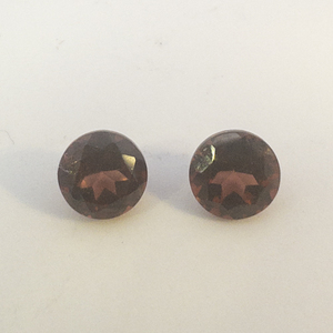 Pair of TANGA GARNET - 1.3 twct. Round brilliant cut