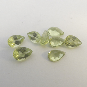 8 PERIDOT - 3.45ct. Pear shape brilliant cut