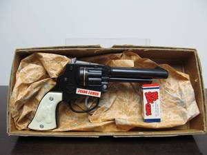 lot 19 image: Like-New Vintage JESSE JAMES Cap Pistol wRoll of Caps