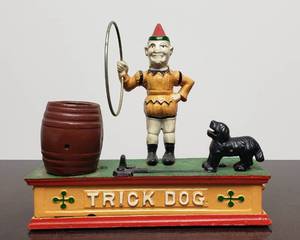 lot 91 image: Trick Dog Cast Iron Mechanical Bank Jumping Dog