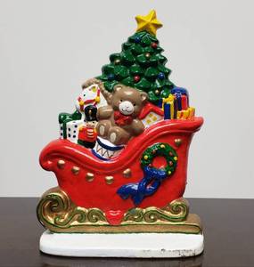 lot 94 image: Vintage Cast Iron Christmas Sleigh Toys Filled Door Stop 8