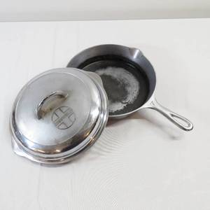 lot 15 image: Griswold Cast IronChrome Pan and Lid No. 7 (701C)