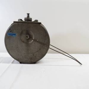 lot 16 image: Antique Round Kerosene Can Dispenser