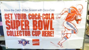 lot 80 image: Vinyl Coca-Cola Super Bowl XXVI Advertising Banner 1991