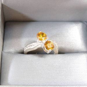 lot 114 image: 925 Orange Stone and Cubic Zirconia Ring