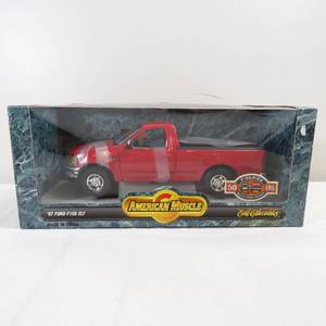 lot 136 image: Ertl Collectibles 118 American Muscle 1997 Ford F150 XLT Truck