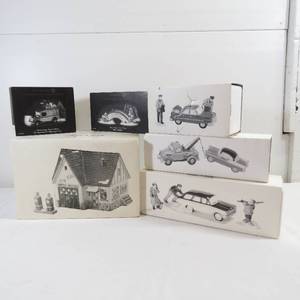lot 255 image: Department 56 Snow Village Service Station and Additional Cars