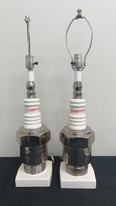 lot 22 image: Pair of Vintage Porcelain Champion Spark Plug Lamps