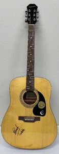 lot 9 image: Guitar Signed by Randy Travis