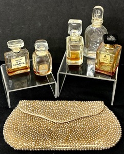 lot 83 image: Vintage Petite Perfume Bottles and Beaded Clutch and Vintage Chanel No. 19 Perfume Bottle
