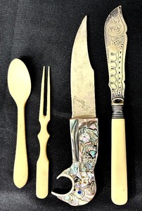 lot 84 image: Vintage Modernist Mexican Abalone Shell Parrot Letter  Bottle Opener and Vintage Bone Utensils