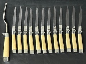 lot 29 image: Vintage Cutlery Set including a Two piece Vintage Carving Set