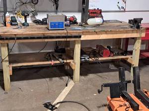 lot 60 image: Wooden Work Bench with Power Strip 36x96x37