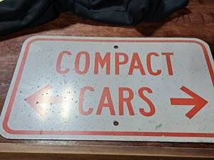 lot 118 image: Compact Cars Metal Sign