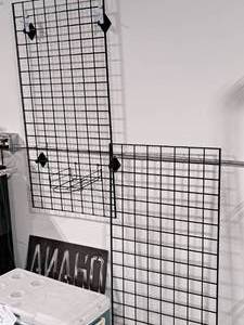 lot 152 image: Lot of (2) Metal Grate Display Racks