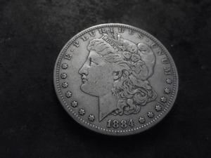 lot 11 image: 1884 S Morgan Silver Dollar