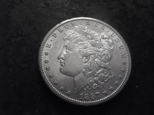 lot 14 image: 1887 S Morgan Silver Dollar
