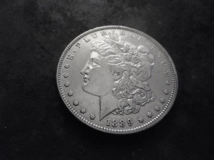 lot 15 image: 1889 O Morgan Silver Dollar