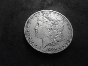 lot 26 image: 1895 O Morgan Silver Dollar