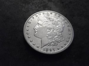 lot 28 image: 1897 S Morgan Silver Dollar