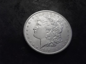 lot 35 image: 1904 O Morgan Silver Dollar
