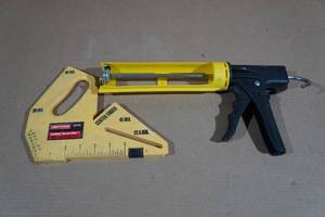 lot 231 image: Craftsman Table Saw Push Shoe with Caulk Gun