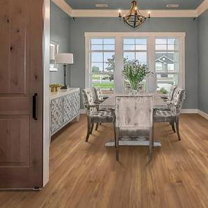 lot 21 image: 12 Boxes 206 Sqft Mohawk Blaze Teak 12MM Thick x 7.5in x 47.25in Laminate Wood Plank Flooring with Attached Padding