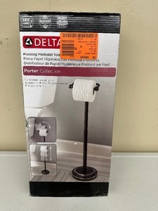 lot 134 image: Delta Porter Collection Pivoting Pedestal Toilet Paper Holder  Oil Rubbed Bronze Part # 74851-ORB