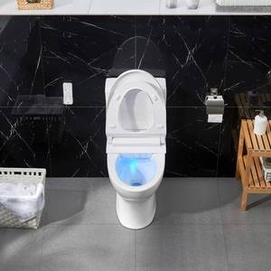 lot 16 image: OVE Decors Bliss Smart Bidet Toilet in White with Heated Seat, Warm Water, Warm Air Drying, Night Light, Remote Control & More - Retail $1399