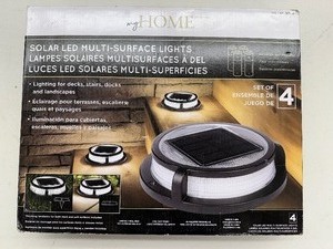lot 140 image: 4 Pack of Sterno Home Solar Multi-Surface Lights
