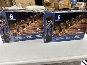 lot 142 image: 2 6 Packs  12 Total Tommy Bahama LED Solar Pathway Bollard lights