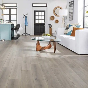 lot 24 image: 7 Boxes 120  Sqft Mohawk Blaze Teak 12MM Thick x 7.5in x 47.25in Laminate Wood Plank Flooring with Attached Padding