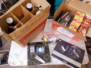 lot 87 image: Cigarette roller, cigarette tubes, wine gift set, and billiard balls