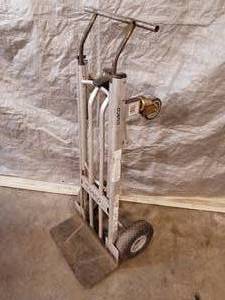 lot 13 image: Cosco convertible moving dolly (handle has been repaired)
