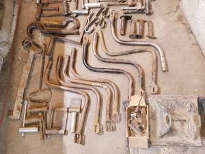 lot 10 image: Large lot of assorted semi-truck parts and hardware