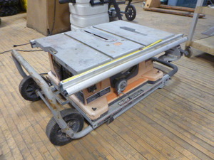 lot 74 image: Ridgid Table Saw with Rolling Work Stand