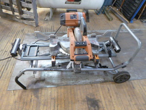 lot 147 image: Ridgid 10 Dual-Bevel Sliding Compound Miter Saw