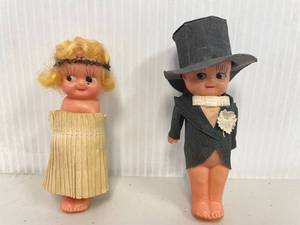 lot 33 image: Vintage Bride & Groom Celluloid Dolls - bride missing arms