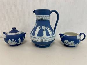 lot 49 image: Wedgwood Jasperware Tea Set Pitcher has a hairline crack as seen in photo