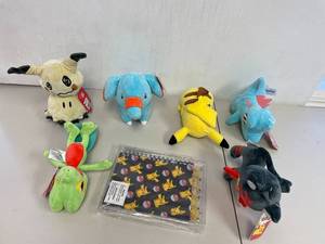 lot 70 image: Pokemon Plush Toys & Notebook Lot