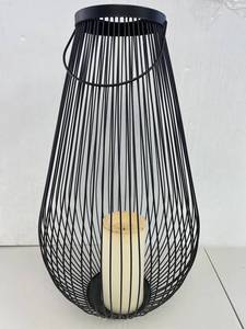 lot 85 image: Loom  Forge Wire Candle Holder