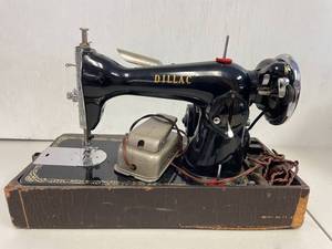lot 110 image: Vintage Cadillac Sewing Machine