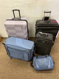 lot 118 image: TravelPro Samsonite Luggage Set