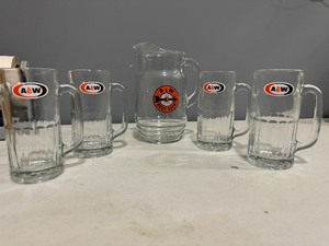 lot 41 image: A & W Pitcher with Four A & W Mugs