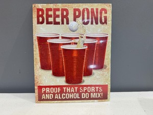 lot 84 image: Beer Pong Proof that Sports and Alcohol Do Mix Tin Sign