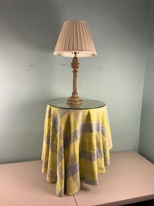 lot 27 image: Side Table with Glass Top, Tablecloth, and Small Lamp