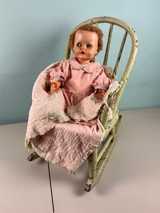 lot 97 image: Creepy Doll in Antique Child Rocking Chair