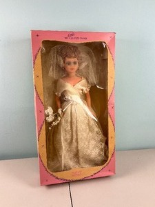 lot 98 image: The Little Peoples Choice Jolly Wedding Bride Doll in Box