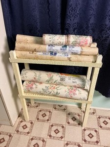 lot 187 image: Small Plastic Shelf with Wall Paper