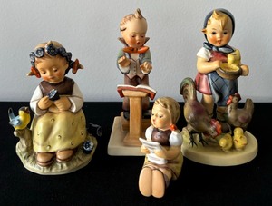 lot 68 image: Four Vintage Hummel Figurines